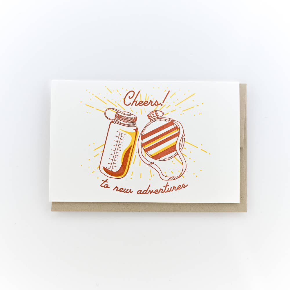 Cheers To New Adventures Greeting Card