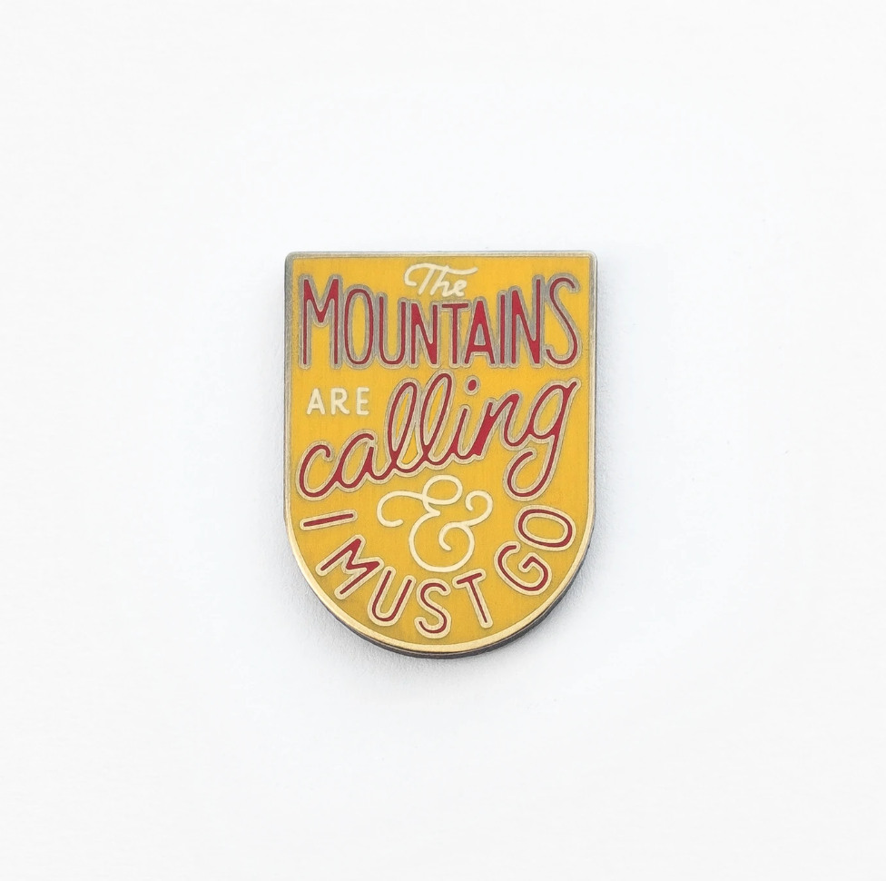 The Mountains are Calling Enamel Pin